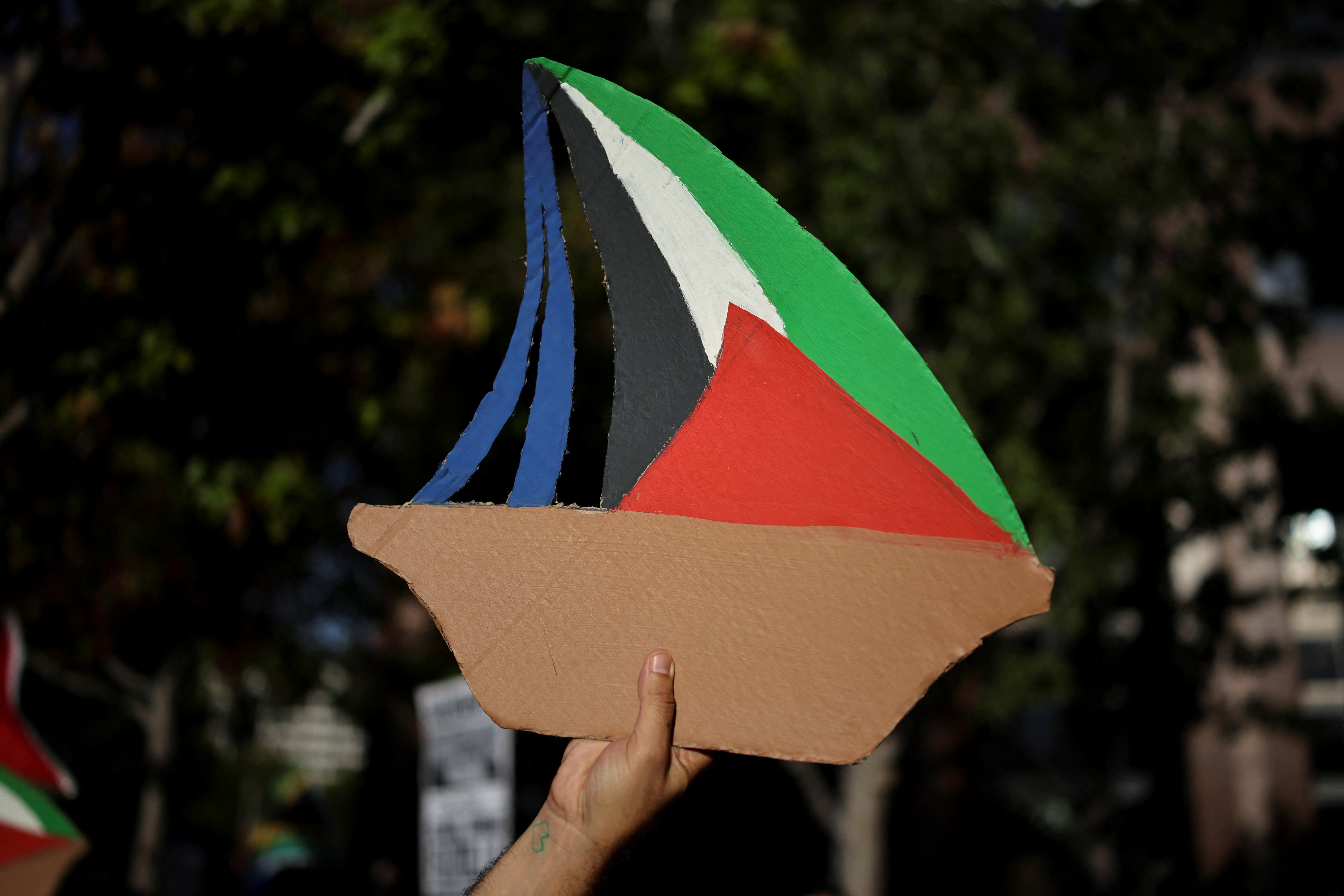 Last flotilla boat sails on towards Gaza after Israel interceptions